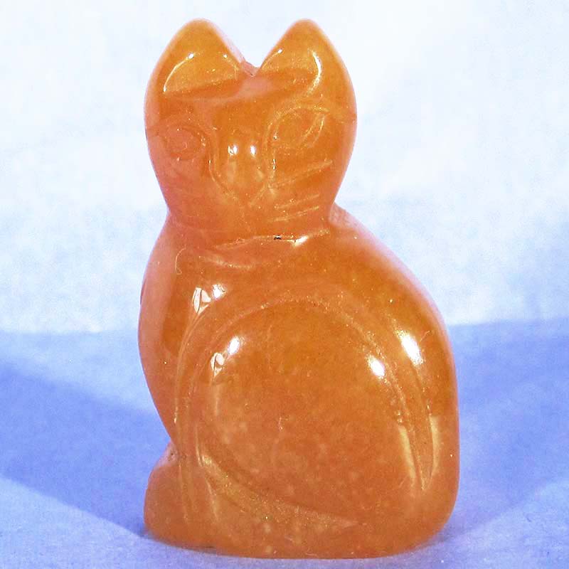 carved peach aventurine cat