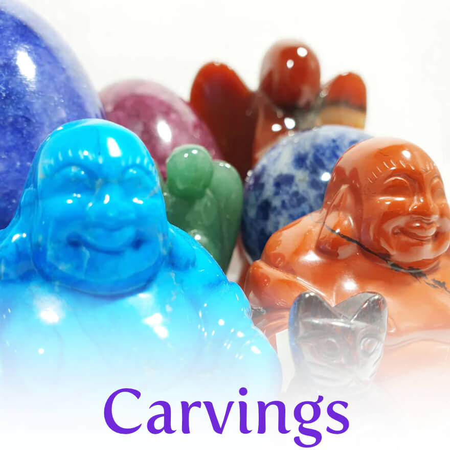 Crystal carvings showing animals and buddhas