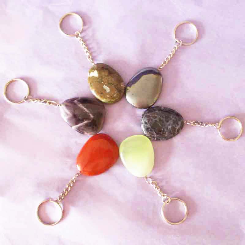 6 crystal keyrings laid out in a circle