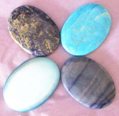 4 palm stones: sodalite, lapis lazuli, howlite and cats eye
