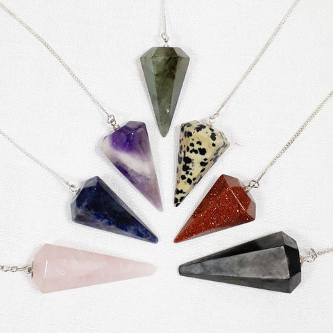 7 crystal pendulums on silver chains; rose quartz, amethyst, labradorite, goldstone and jasper