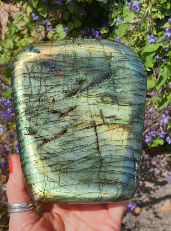 A stunning chunk of polished  labradorite crystal
