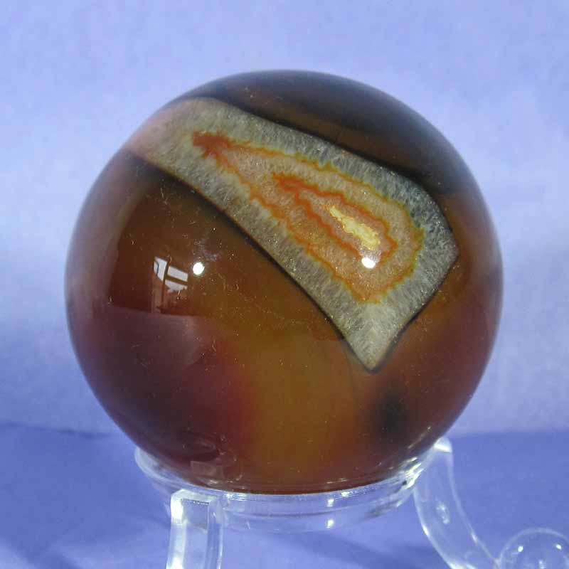 carved carnelian sphere with a stunning rectangular quartz marking